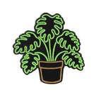 Load image into Gallery viewer, Neon-Monstera-Glow-in-the-Dark-Plant-Enamel-Pin-by-real-sic-wide